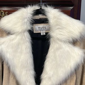 Beautiful Tan soft Leather hip length coat with faux fur trim.